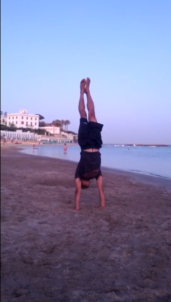 Beach handstand practice in Santa Marinella, Italy