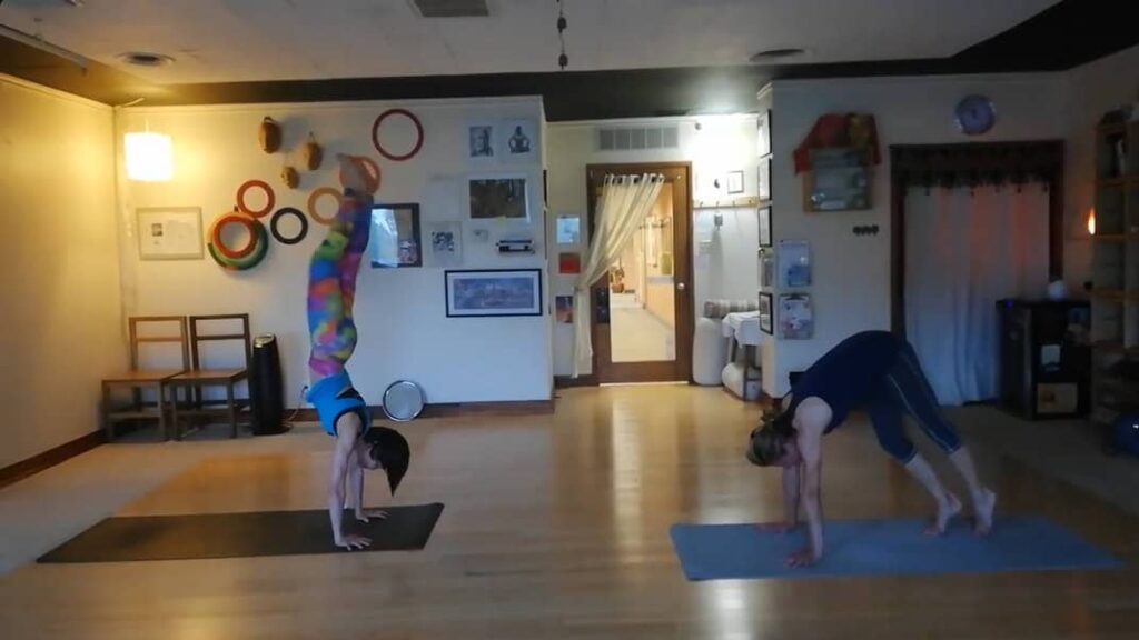 Michele and Grace handstand practice